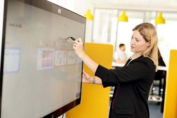 Women working on a whiteboard