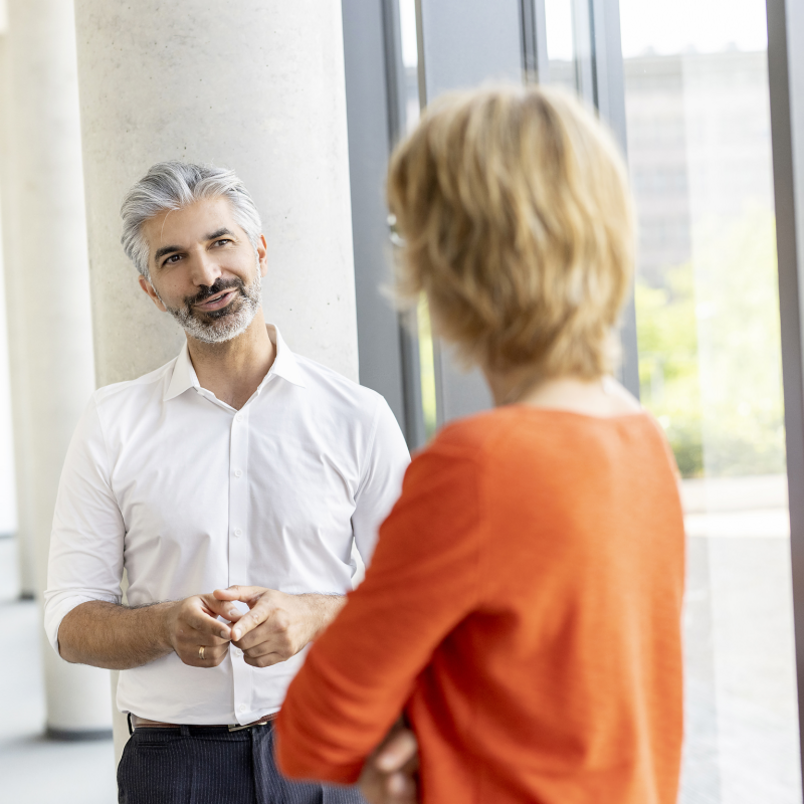 Two colleagues talking