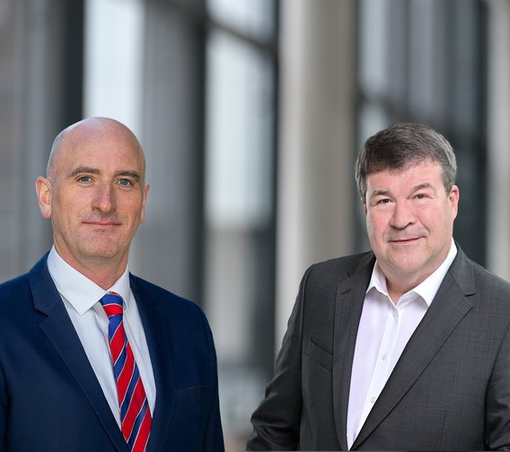 Two professional businessmen in suits